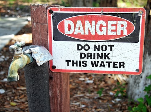 sign warning of contaminated water